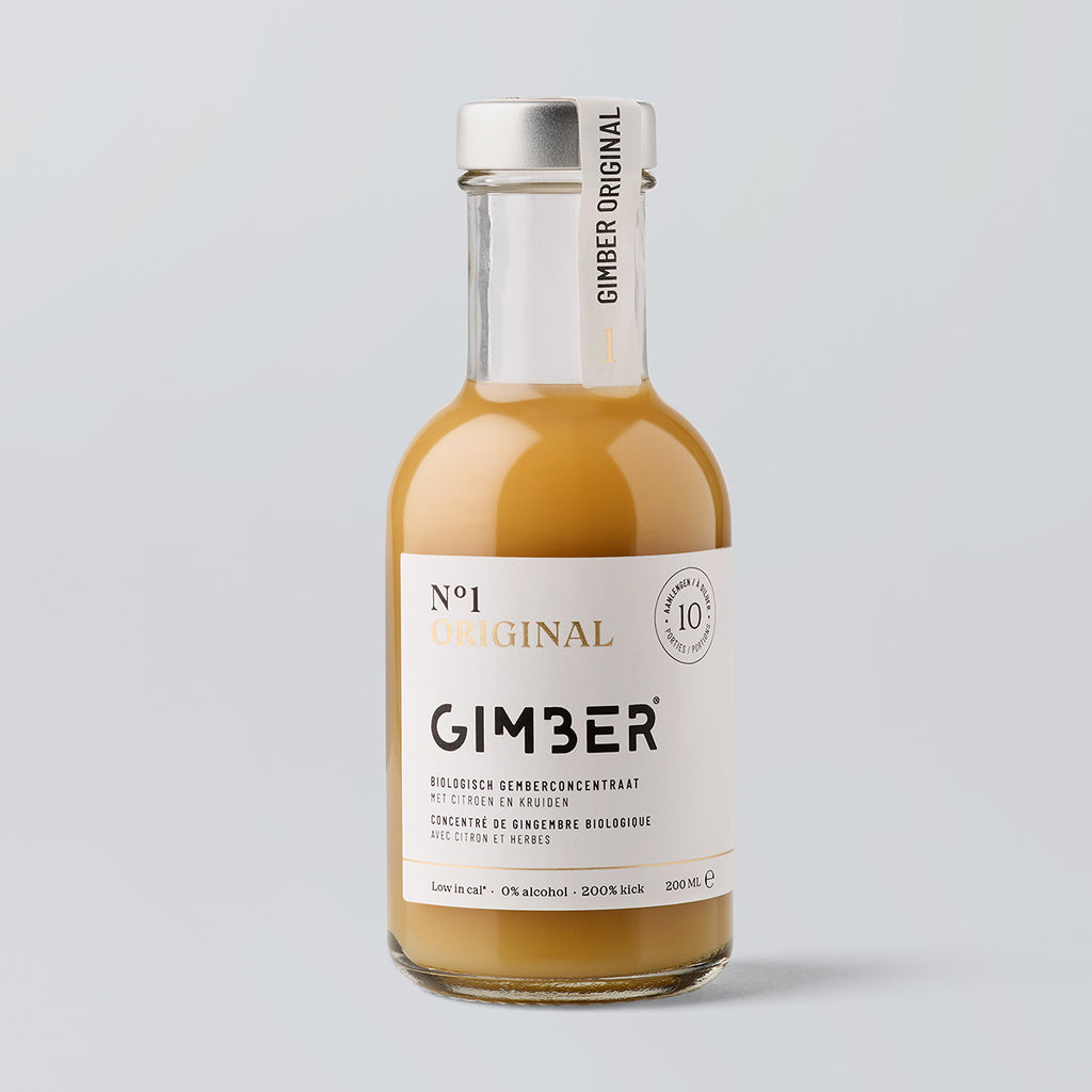Bottle of Gimber ginger concentrate on a light gray background